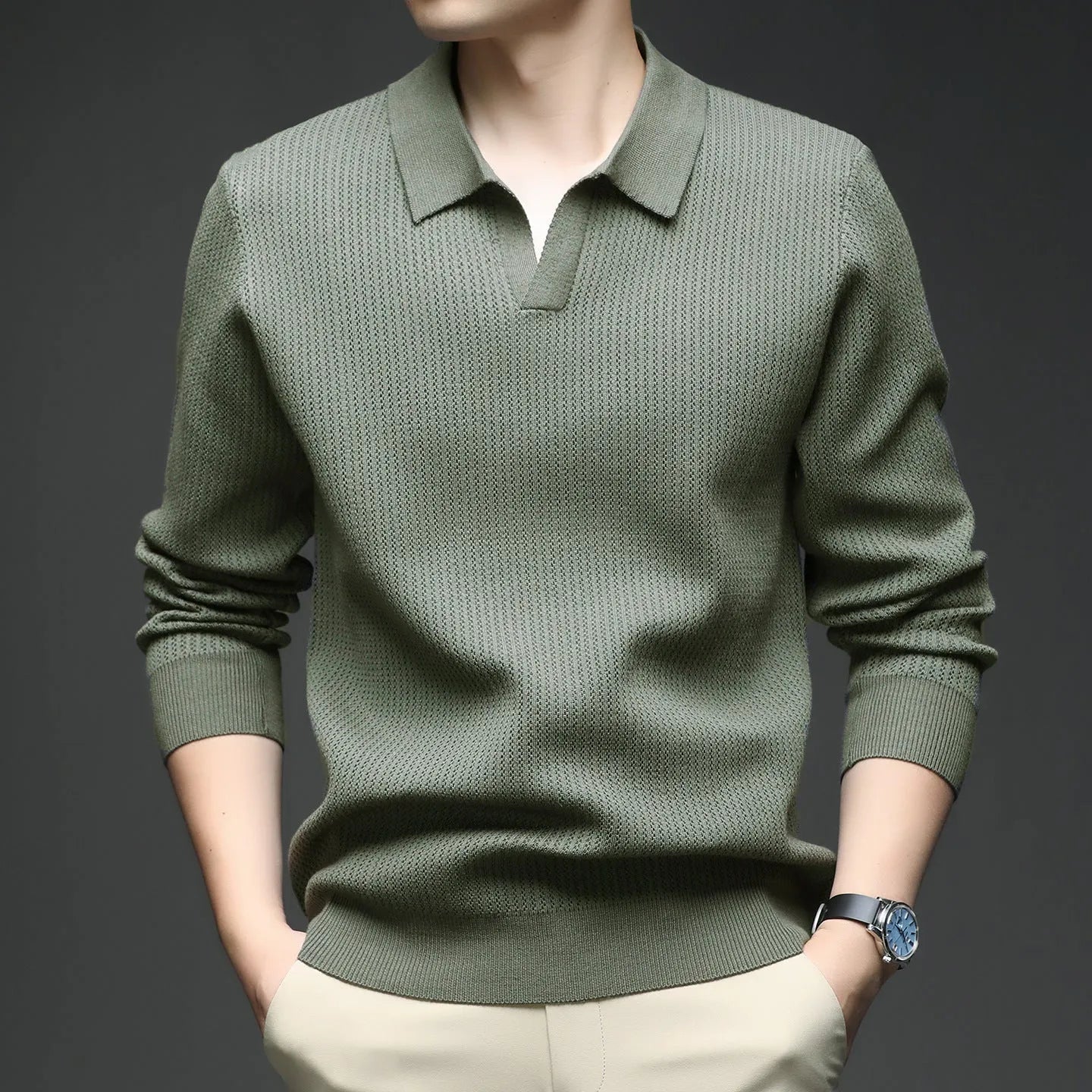 Man wearing a loose fit green casual pullover sweater, autumn casual style