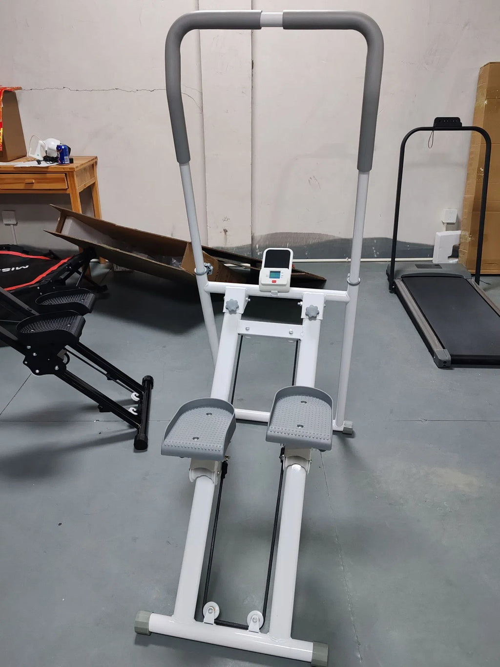 Multifunctional stair climber with steel frame in black for home fitness use