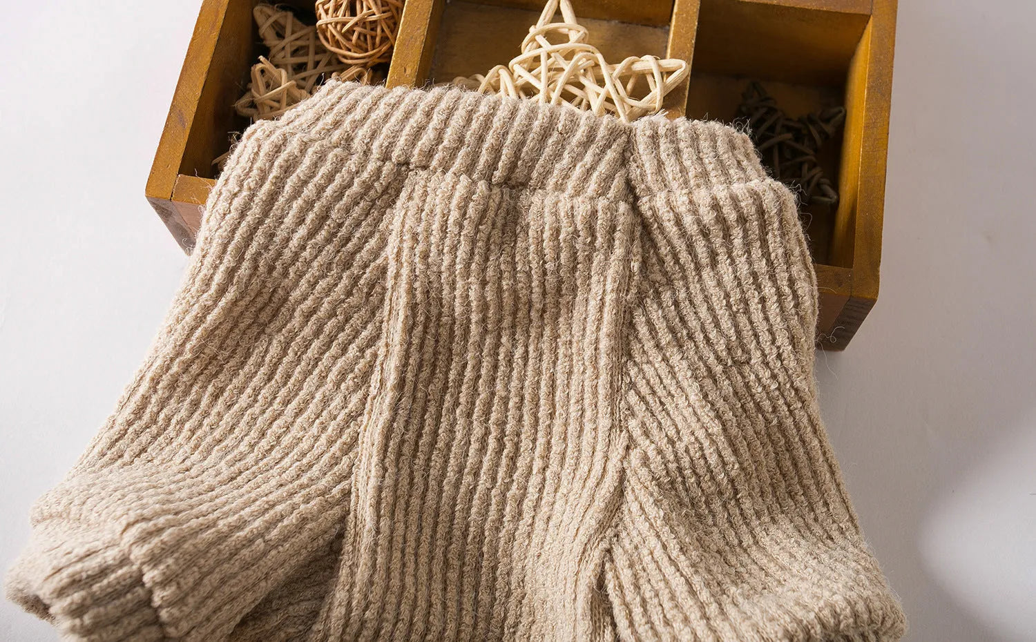 Brown knitted pullover sweater on small dog showing casual design with five size options