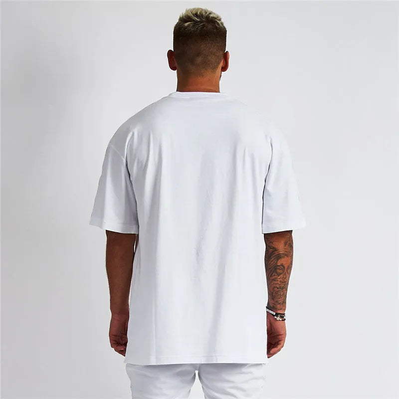 Men's five-point sleeve bodybuilding sports T-shirt in cotton, round neck, black colour, front view