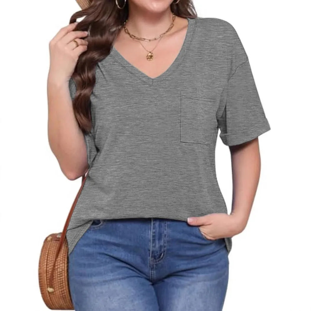 Grey loose V-neck t-shirt with pocket and short sleeves laid flat