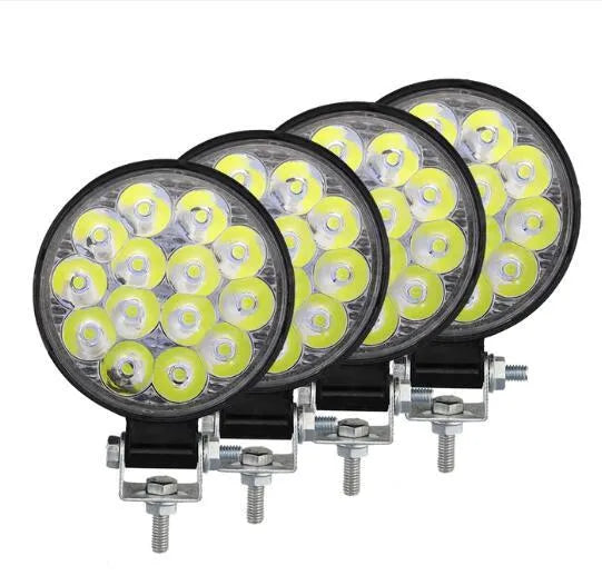 Round white LED work light with aluminium housing for vehicle mounting