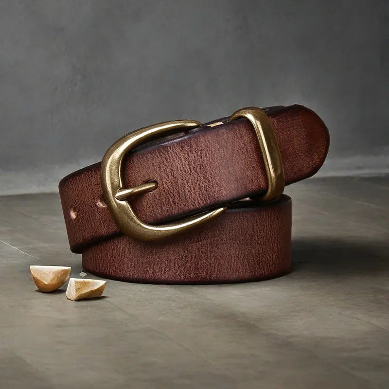 Men's black genuine cowhide leather belt with a copper pin buckle on a white background.