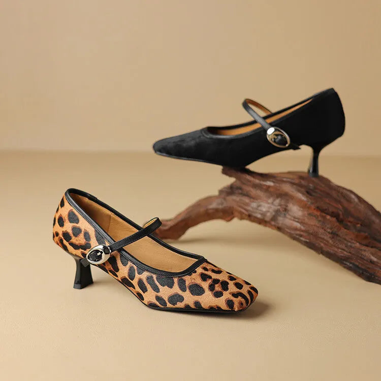 Women's black square toe stiletto ankle-strap shoes with a textured horse hair upper.