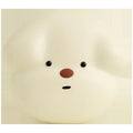 Wireless plug-in doorbell beeper for household use in white or milky yellow.