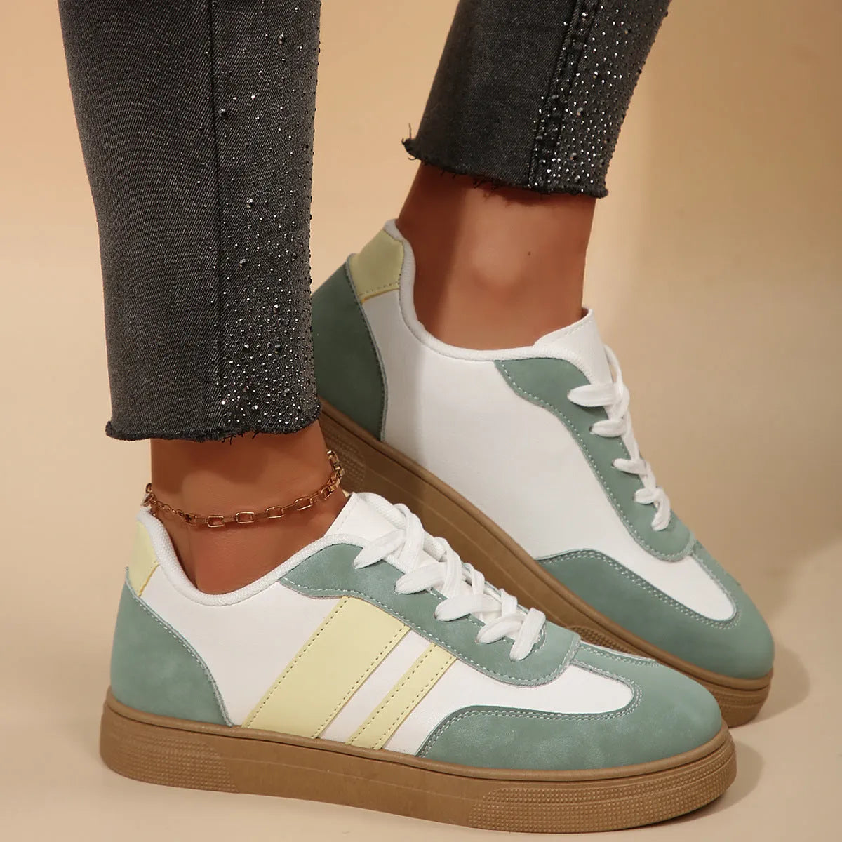 Green women's retro casual pumps with cross straps, low heel, and round toe.