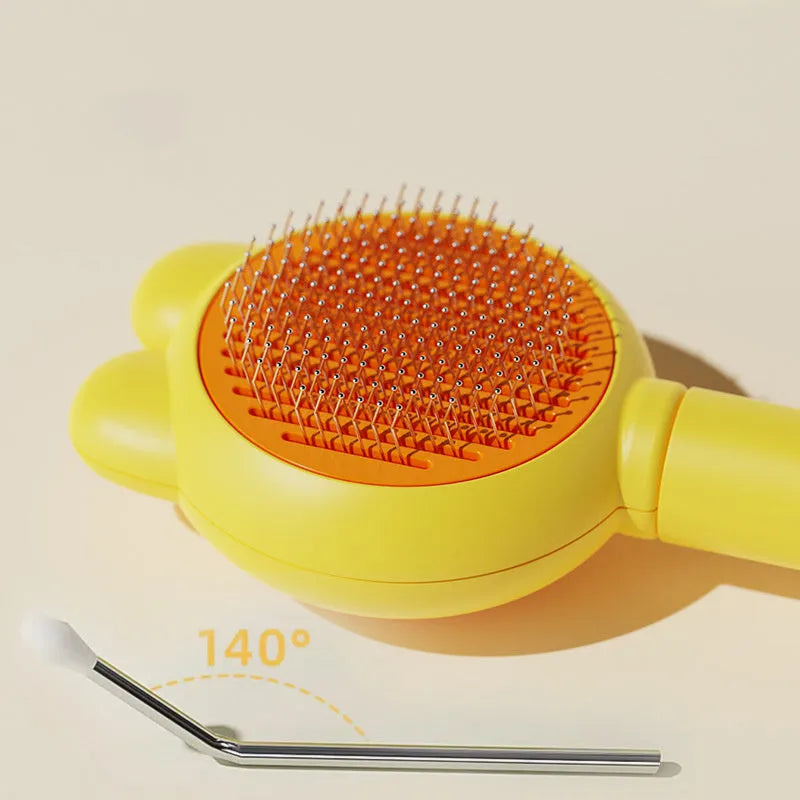Self-cleaning pet grooming brush with release button in four colour options