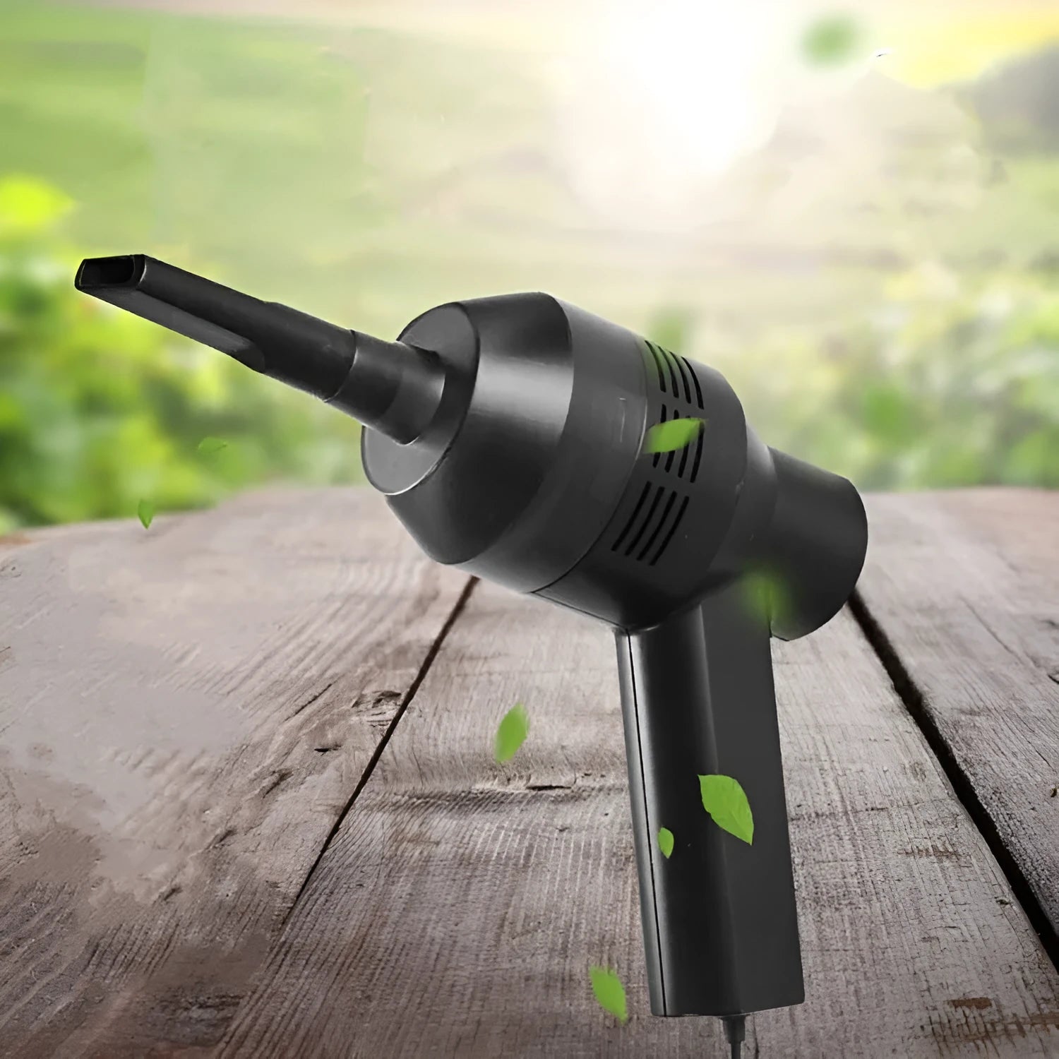 Black cordless USB desktop mini vacuum cleaner for keyboard and computer dust clean-up.
