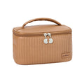 Cake-shaped open-top women's makeup bag in PU leather, shown in a solid colour from the available range.