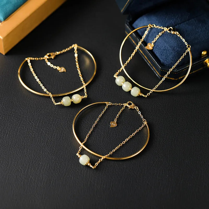 Women's Hetian jade lucky beads bracelet with gold inlay, shown in single, double, and three beads versions.