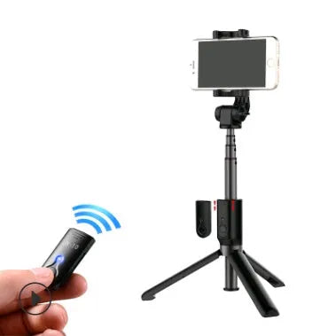 Black Bluetooth selfie stick with tripod bracket extended, holding smartphone
