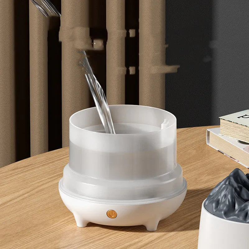 Black or white round Volcano humidifier with USB cable for rooms up to 20m2.
