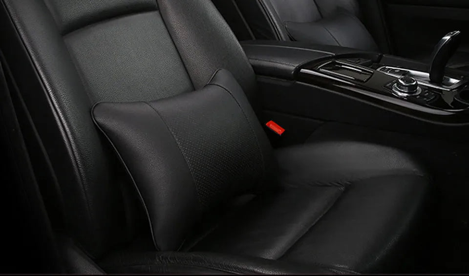 Breathable car headrest with leather cover, down yarn filling, and classic punched ventilation pattern