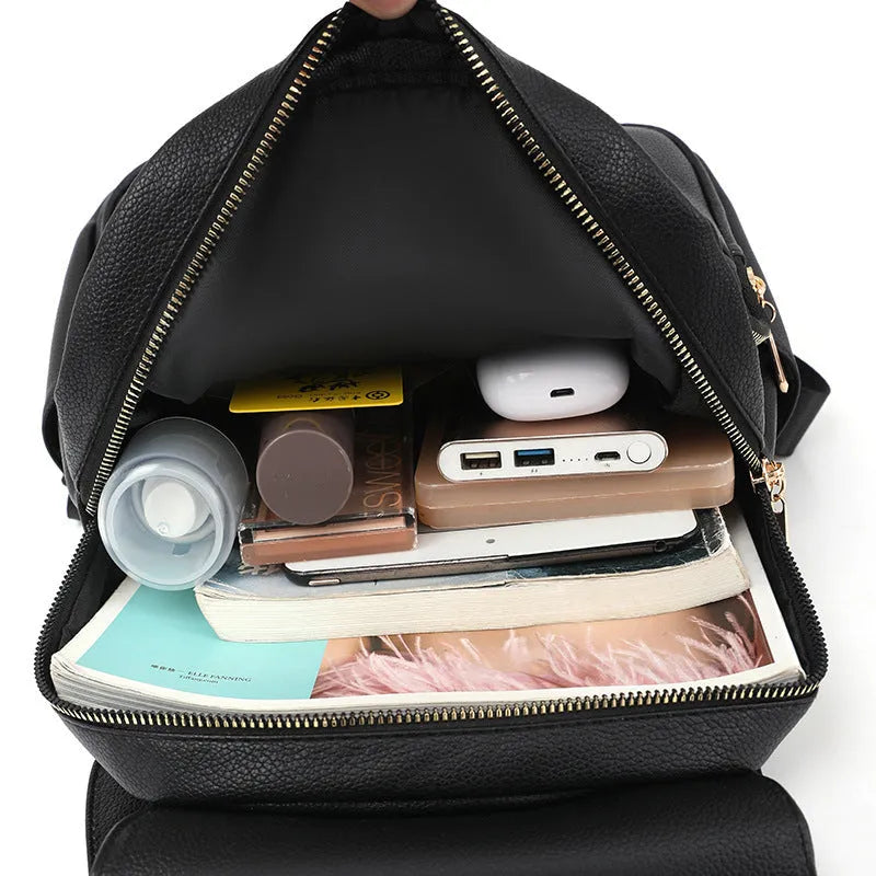Casual black PU leather women's backpack with a three-dimensional front pocket.