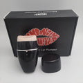 Black electric silicone lip plumper with 3-speed adjustment buttons and USB charging port
