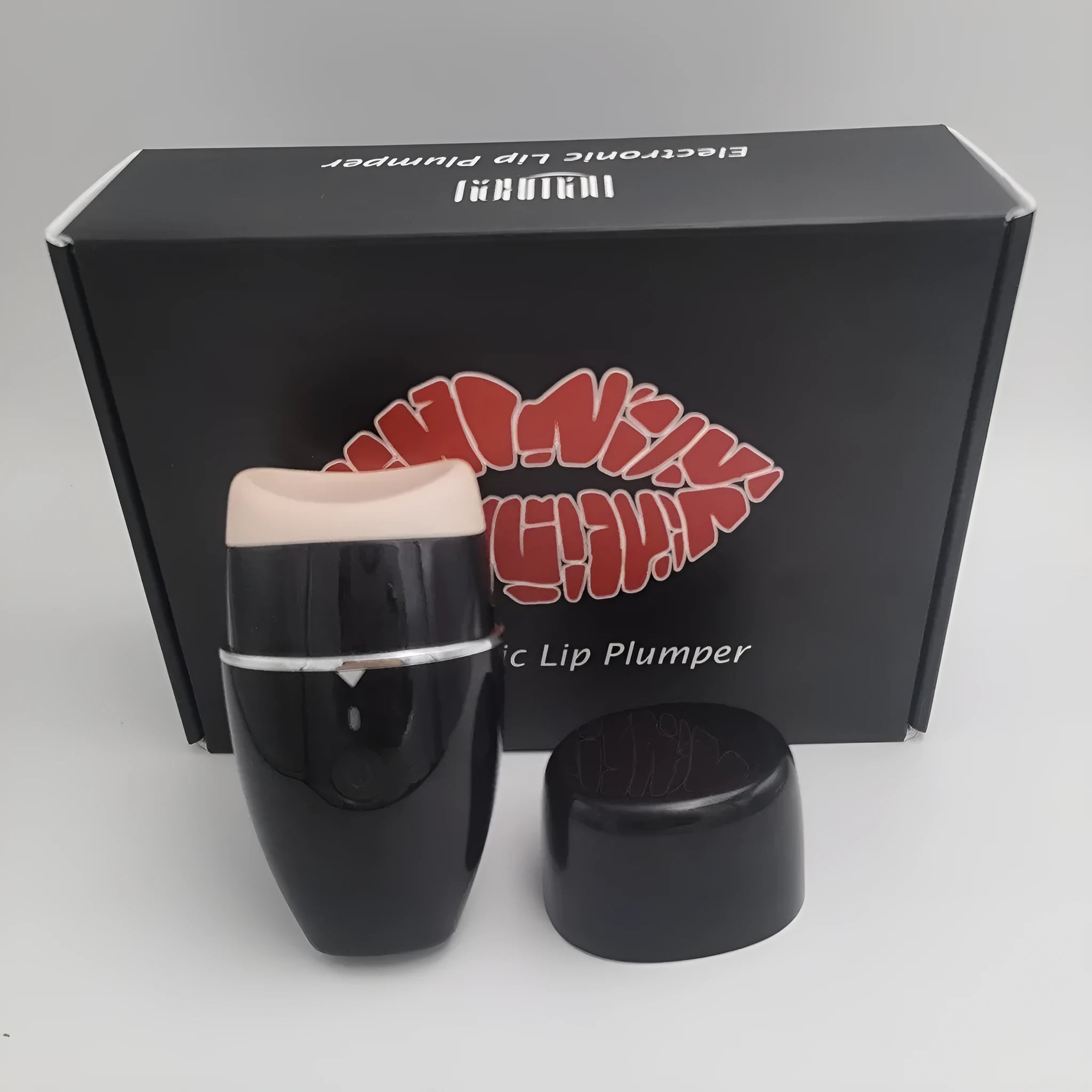 Black electric silicone lip plumper with 3-speed adjustment buttons and USB charging port