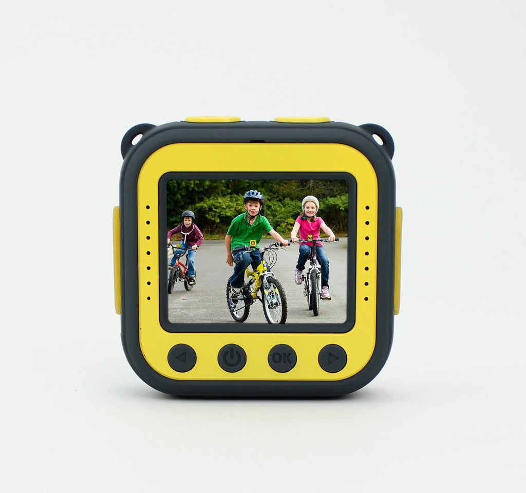 Yellow children's waterproof sports camera showing front view with lens and LCD screen