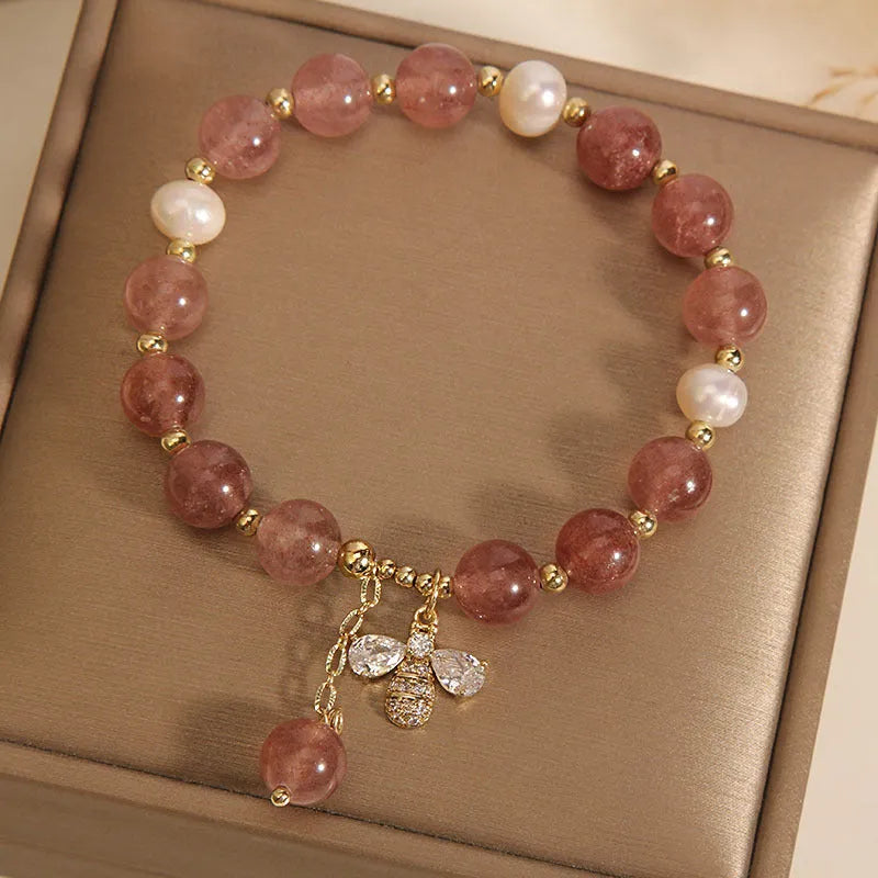 Women's pink strawberry quartz and freshwater pearl bracelet with zircon and alloy accents.