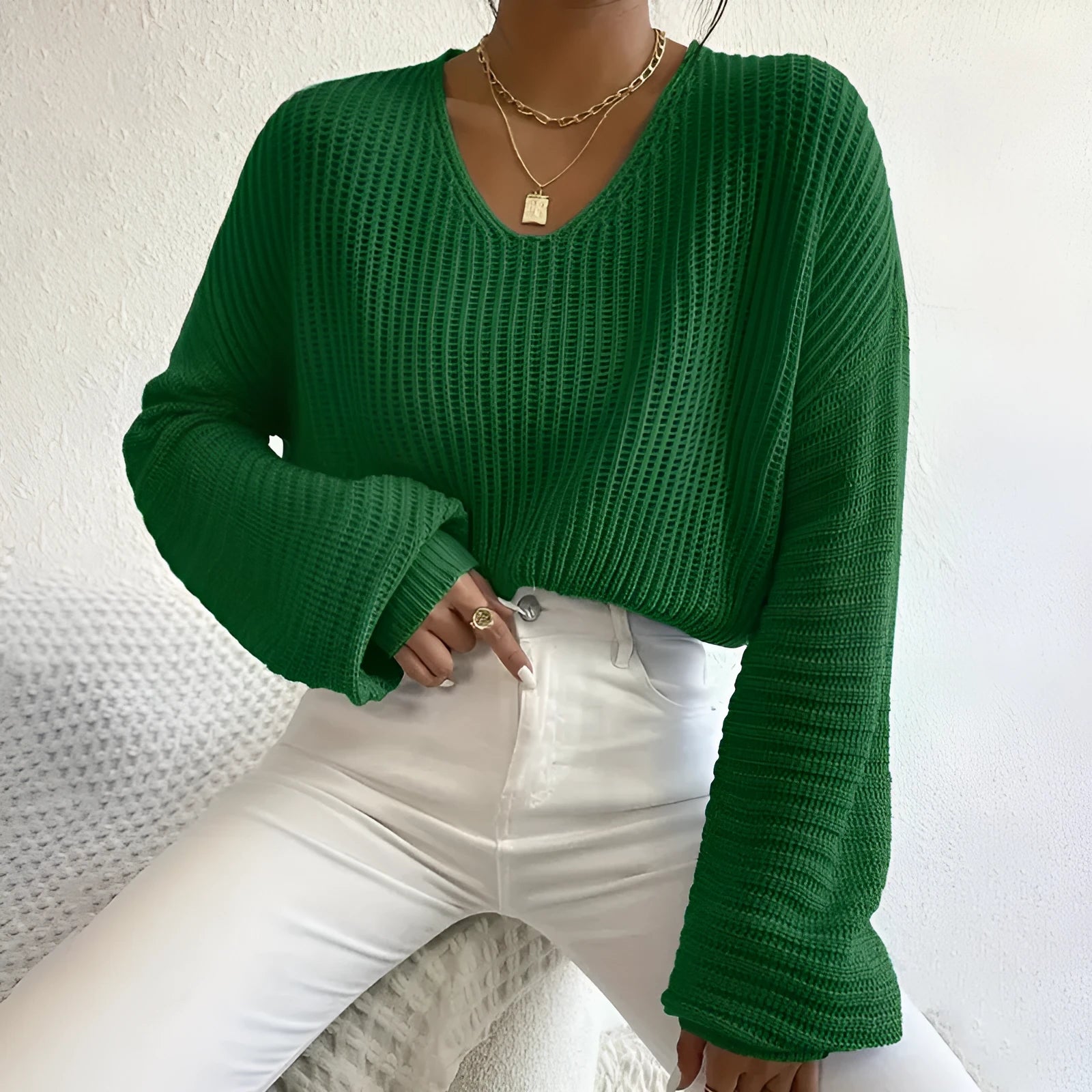 Women's long sleeve polyester pullover in solid colours: black, pink, green, sky blue, and dark red.