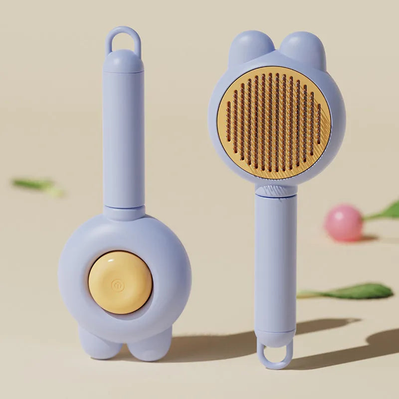 Self-cleaning pet grooming brush with release button in four colour options