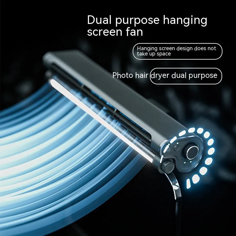 Black bladeless computer fan with screen clamp and integrated lighting lamp, showing USB connection