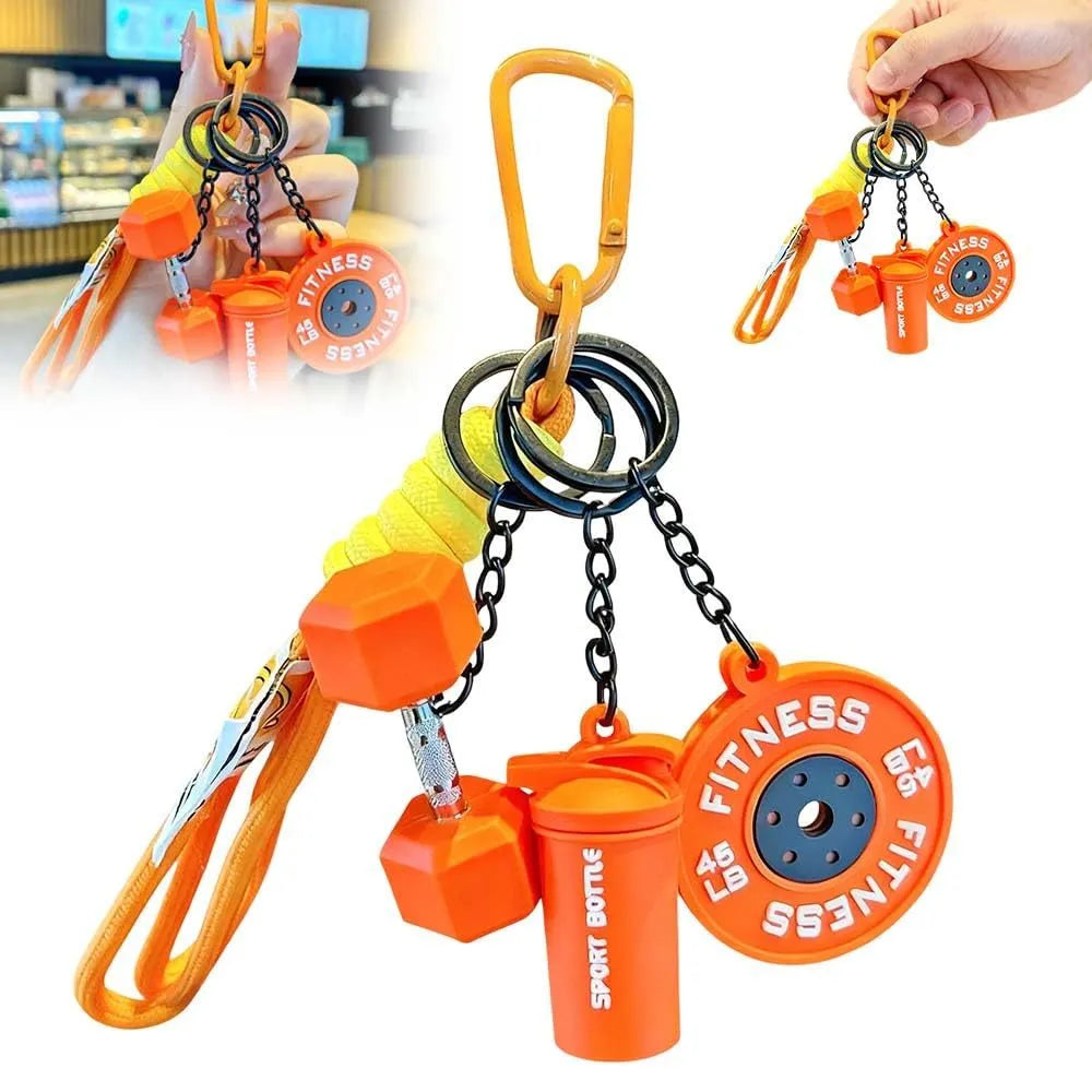 Four mini alloy gym keychains in blue green orange and purple on a keyring