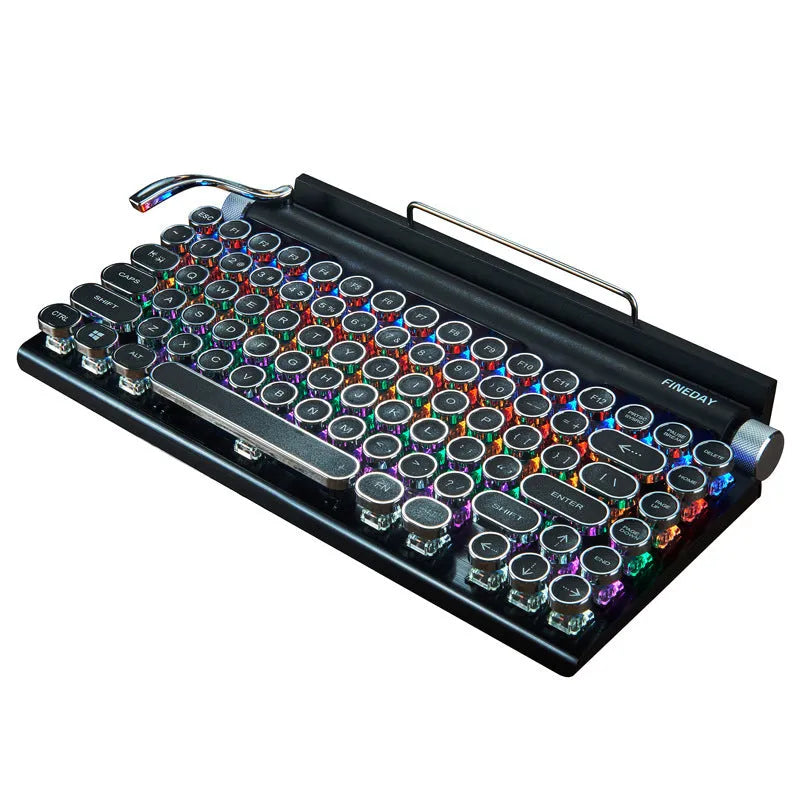 Black dot retro typewriter style Bluetooth mechanical keyboard on a desk.