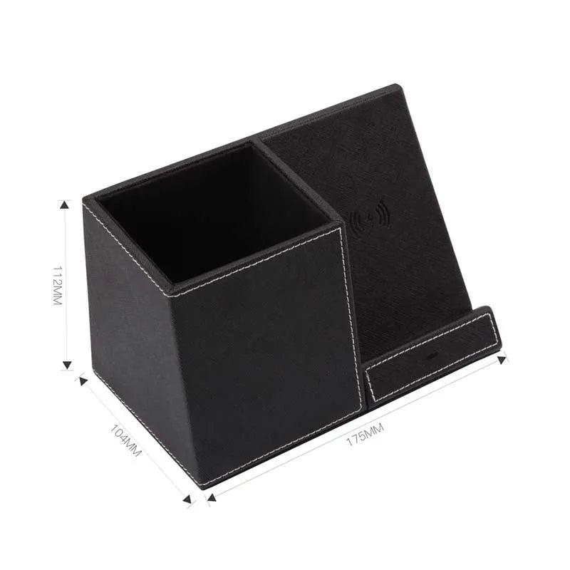 Black leather wireless charging station with phone on stand and pens in holder