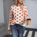 Beige and dark green loose-fit Christmas jumper with round neck and contrasting colour design