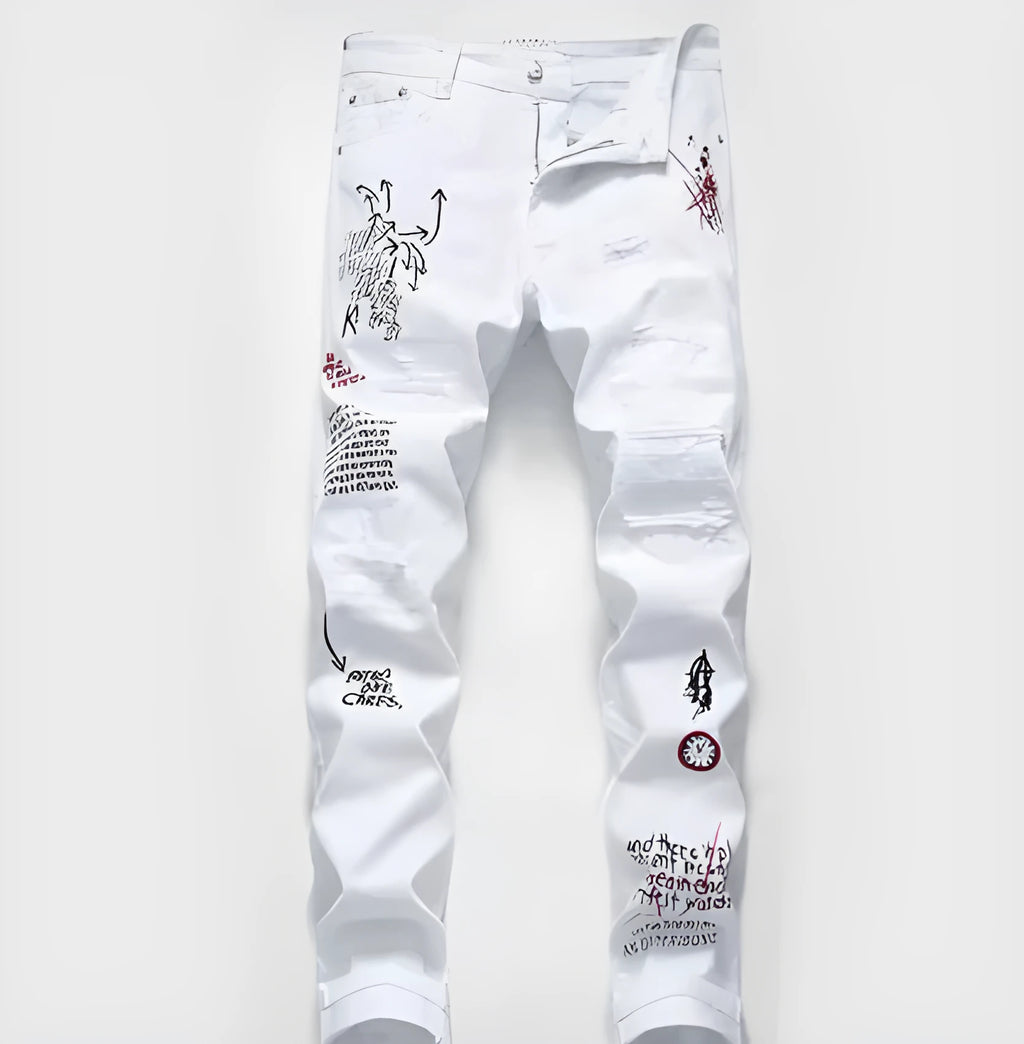 White shredded embroidery jeans in cotton denim, sizes 29-38, with ripped and embroidered details.