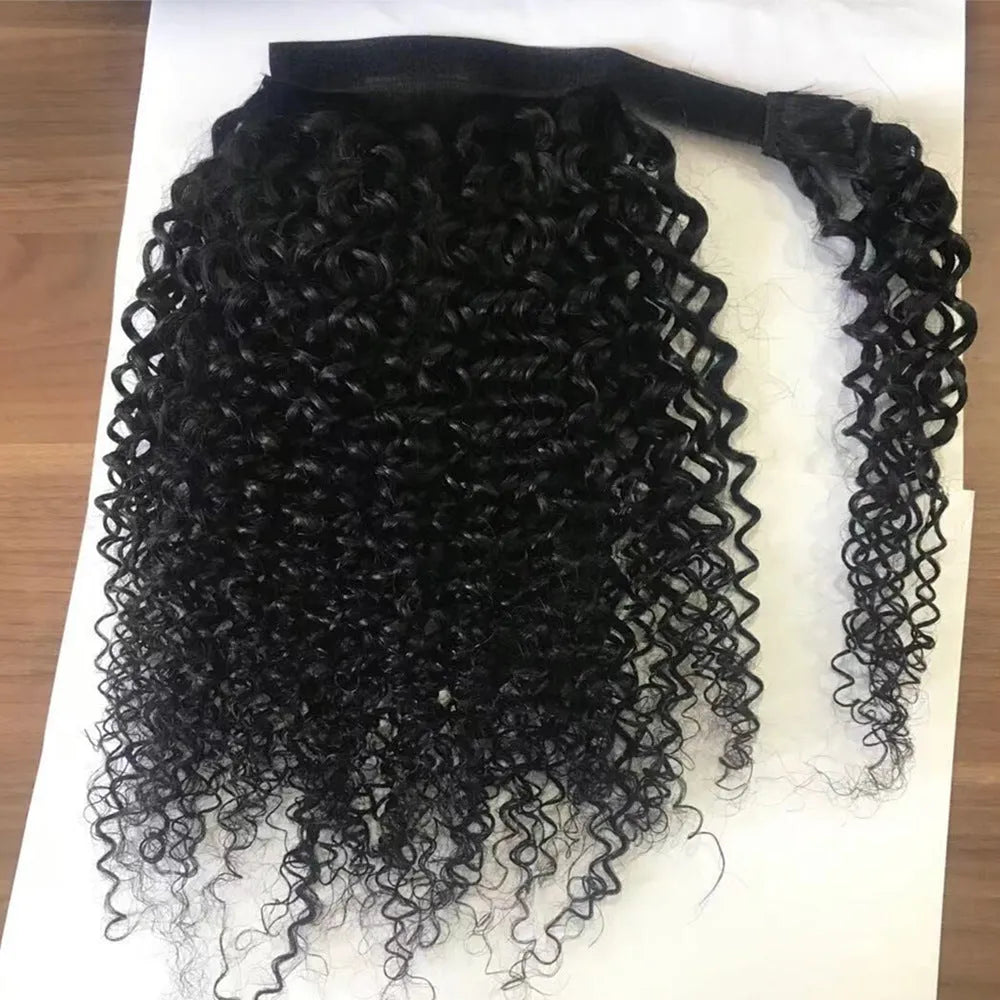 Human hair ponytail with Velcro fastening in natural kinky curly texture on black background