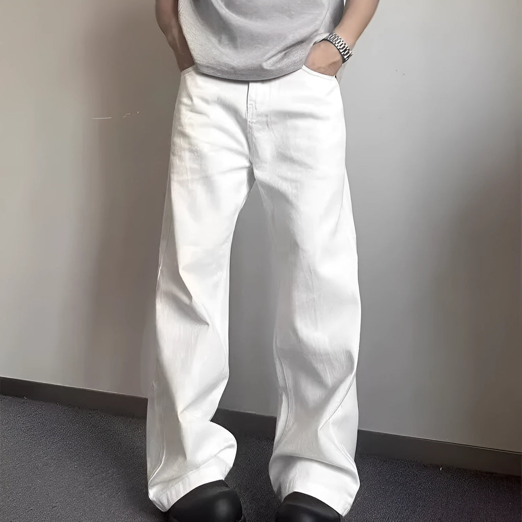 Men's white straight-leg jeans with loose fit and mid-waist cut