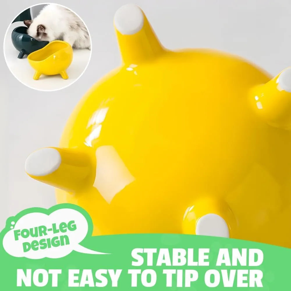 Green ceramic pet food bowl with four legs and wide mouth opening for cats and small dogs