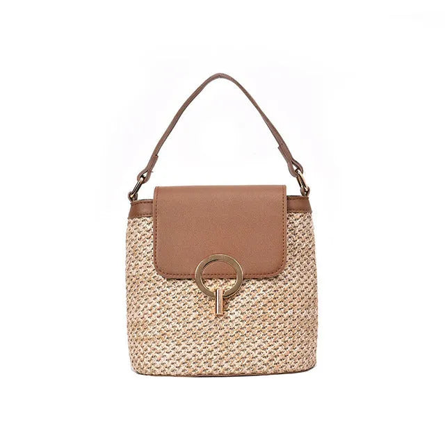 Women's straw woven bucket shoulder bag in black with cover flap, small size, polyester lining