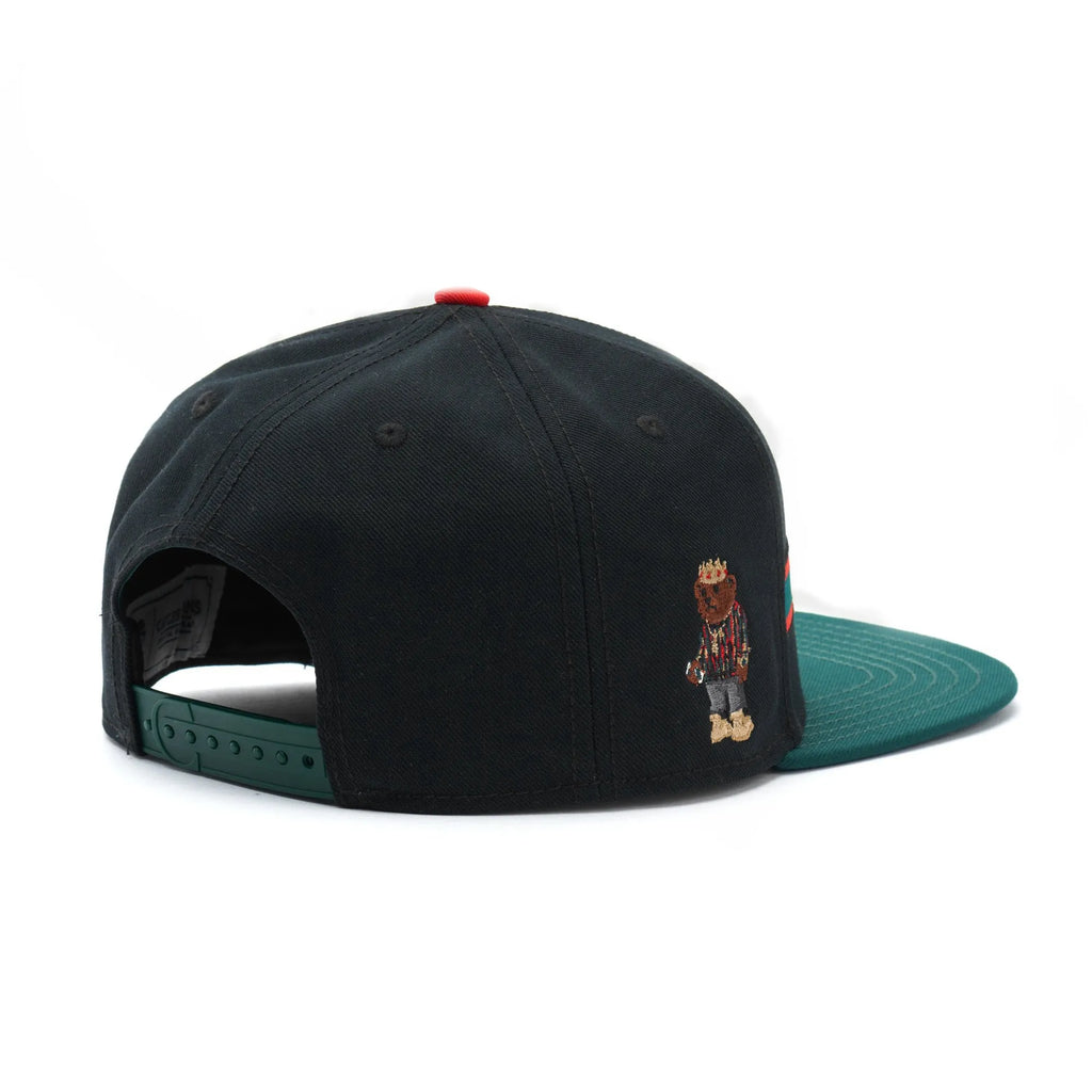 Black embroidered baseball cap with dome crown and adjustable back, front view