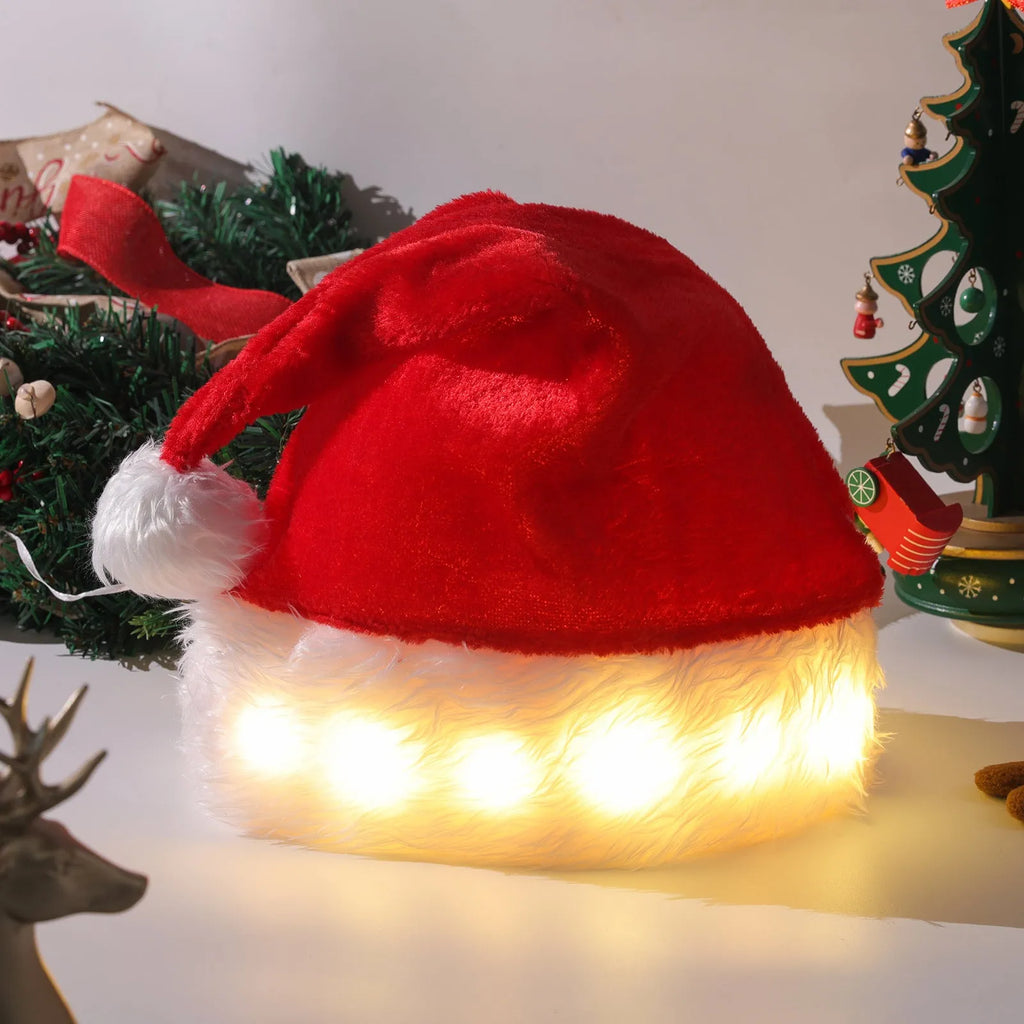 Red and white plush Santa hat with 20 multicolour LED lights glowing around its base and a white pom pom.