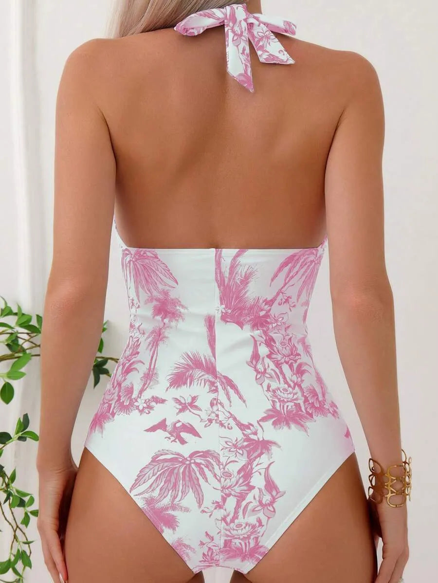 Women's printed V-neck one-piece swimsuit in apricot colour on a size mannequin.