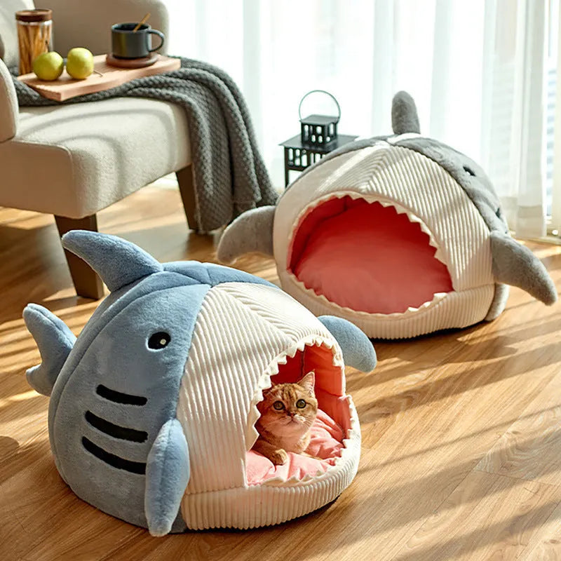 Warm shark cat kennel in blue, semi-closed yurt style, with beige stripe rabbit hair fabric, shown on floor