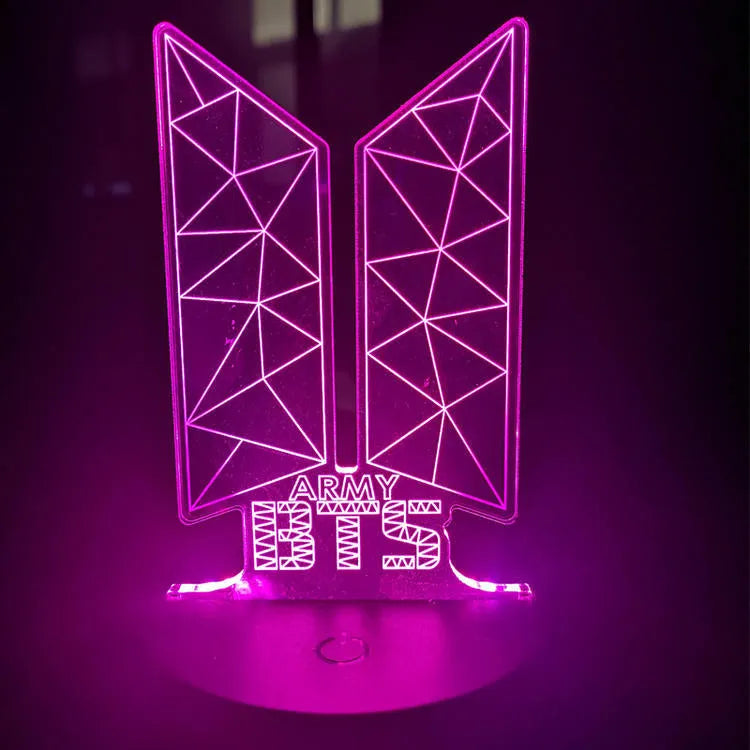 Clear acrylic display stand supporting 101 Tower Gem BTS lamp with universal voltage compatibility