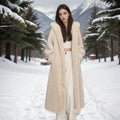Loose fit long brown leopard print faux fur coat for women on a hanger.
