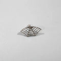 Spider web geometric mesh design stud earrings in gold and silver electroplated finishes.