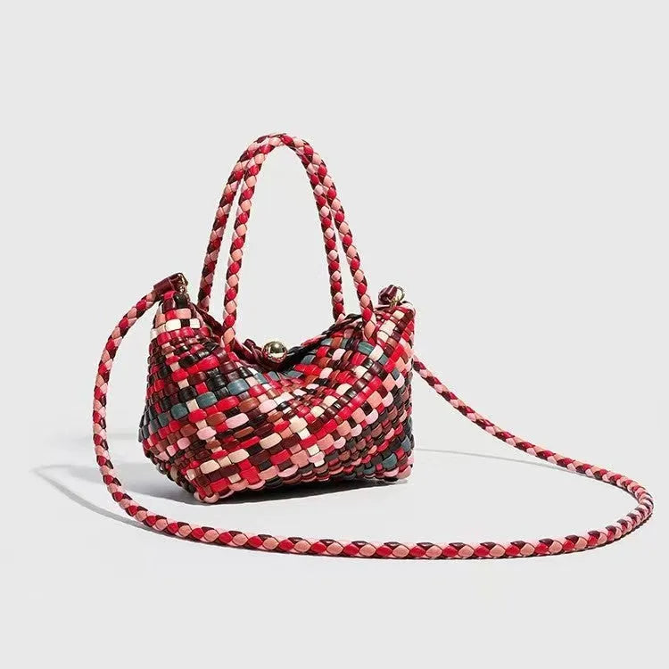 Colourful handmade woven women's PU leather shoulder bag shown from the front.