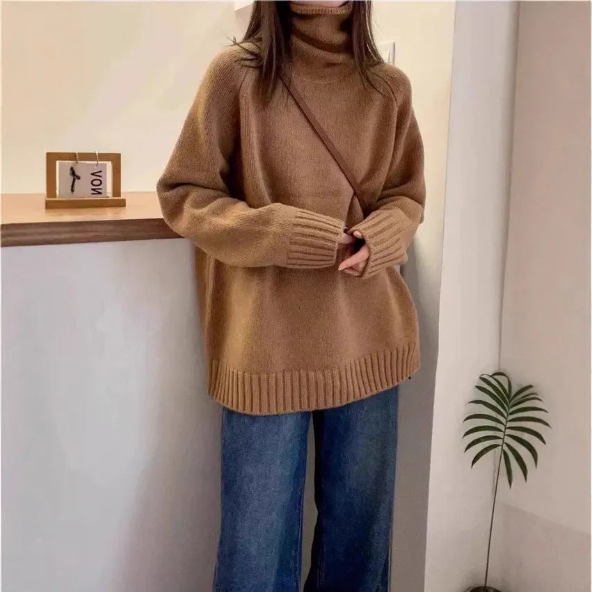 Women's loose fit turtleneck sweater with thick curling pile collar in camel colour