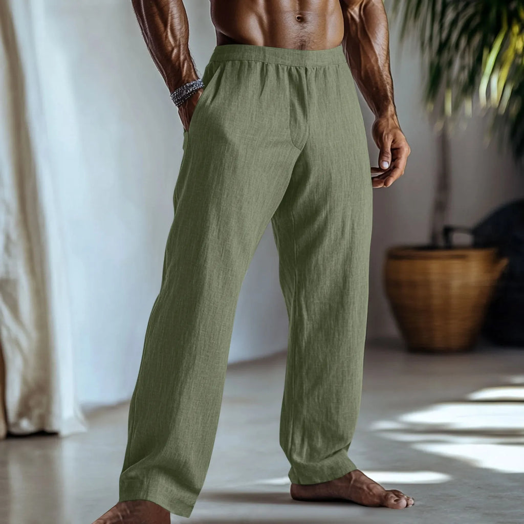 Men's straight-leg trousers in a cotton linen blend, shown in light green colour with side pockets.