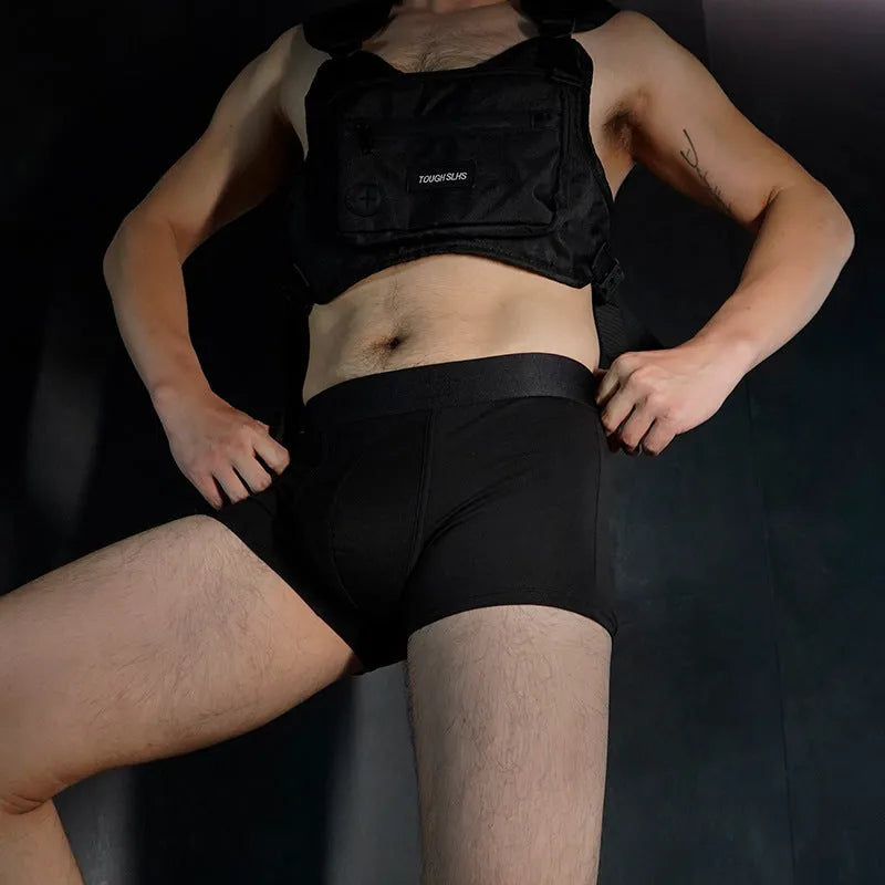 Men's solid colour cotton boxer shorts in black, white, silver grey, and light green.