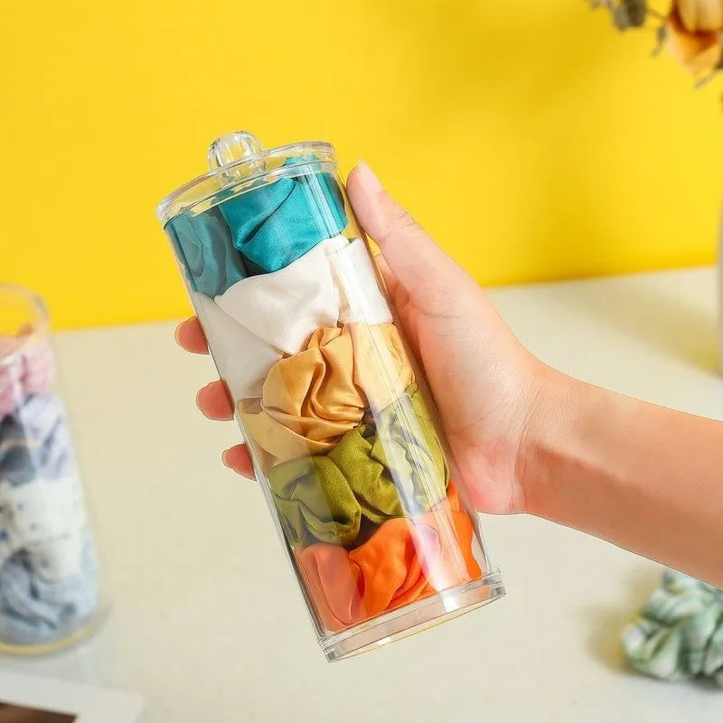 Transparent PE plastic pull-out storage box with cover for hair rings, desktop organiser, modern minimalist style.