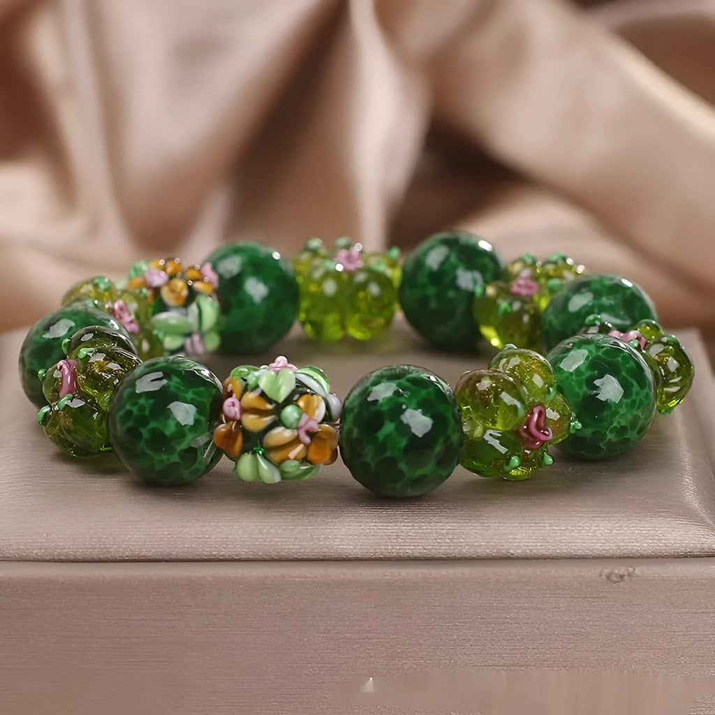Chinese ancient flower glazed bracelet for women, green electroplated finish with floral charm