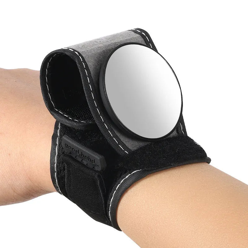 Black wrist-mounted bicycle rear-view mirror with adjustable nylon strap for cycling safety