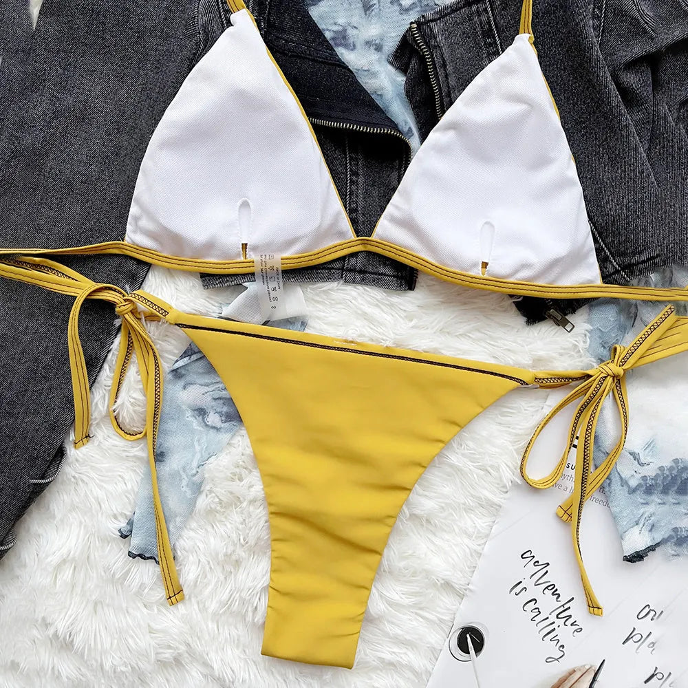 Yellow women's triangle strap nylon bikini set on display