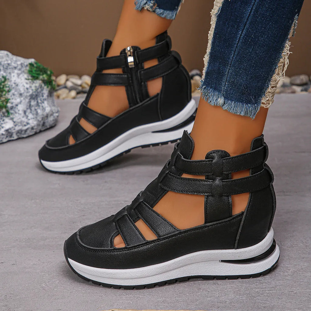 Women's black platform sandals with closed-toe hollow-out design and velcro fastening